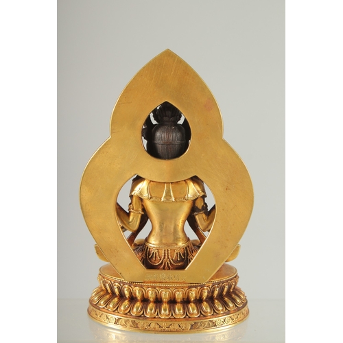 41 - A FINE TIBETAN GILDED ALLOY BUDDHA, 17cm high.