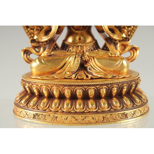 41 - A FINE TIBETAN GILDED ALLOY BUDDHA, 17cm high.