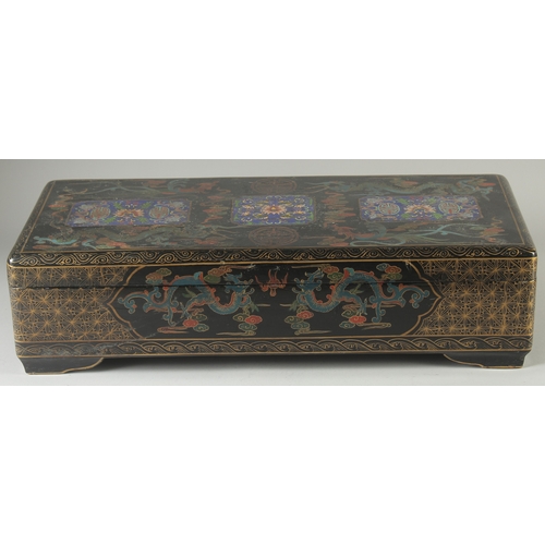 472 - A LARGE CHINESE BLACK LACQUERED WOOD RECTANGULAR BOX, painted with panels of foliate motifs and bats... 