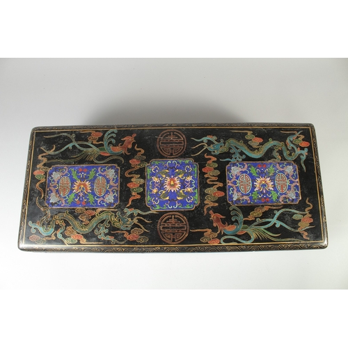 472 - A LARGE CHINESE BLACK LACQUERED WOOD RECTANGULAR BOX, painted with panels of foliate motifs and bats... 