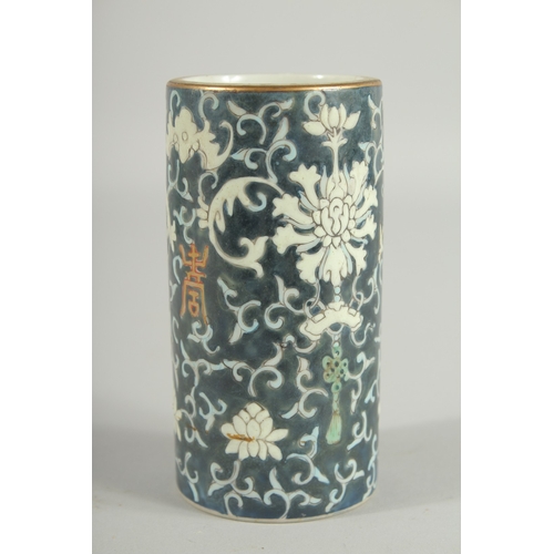 48 - A SMALL CHINESE PORCELAIN BRUSH WASHER, 11.5cm high.