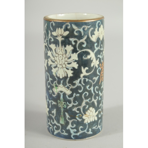 48 - A SMALL CHINESE PORCELAIN BRUSH WASHER, 11.5cm high.