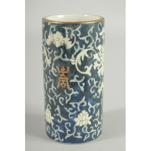 48 - A SMALL CHINESE PORCELAIN BRUSH WASHER, 11.5cm high.