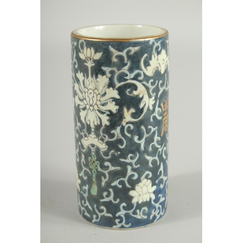 48 - A SMALL CHINESE PORCELAIN BRUSH WASHER, 11.5cm high.