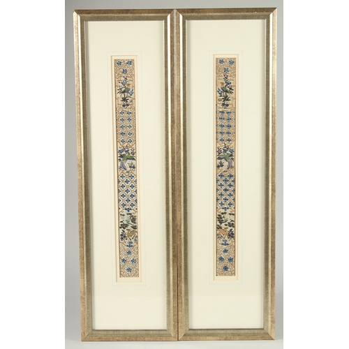 70 - A PAIR OF 19TH CENTURY CHINESE EMBROIDERED SILL TEXTILES, uniformly framed and glazed.