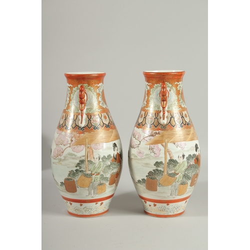 81 - A FINE PAIR OF JAPANESE KUTANI PORCELAIN TWIN HANDLE VASES, painted with a continuous scene depictin... 