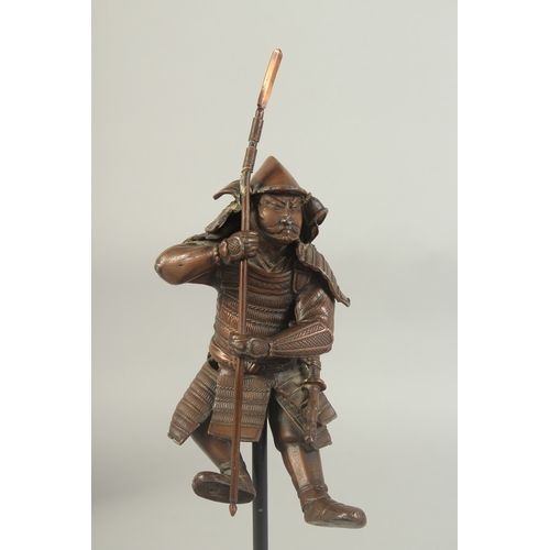 86 - A 19TH CENTURY JAPANESE OKIMONO OF A SAMURAI, elevated on a purpose-made display stand, figure 17cm ... 