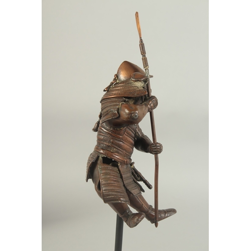 86 - A 19TH CENTURY JAPANESE OKIMONO OF A SAMURAI, elevated on a purpose-made display stand, figure 17cm ... 