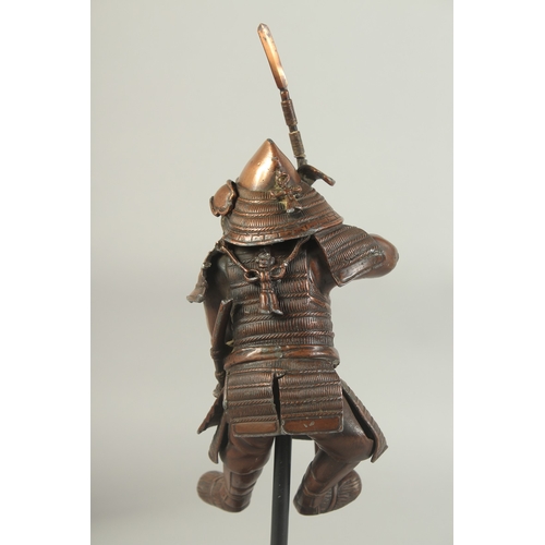 86 - A 19TH CENTURY JAPANESE OKIMONO OF A SAMURAI, elevated on a purpose-made display stand, figure 17cm ... 