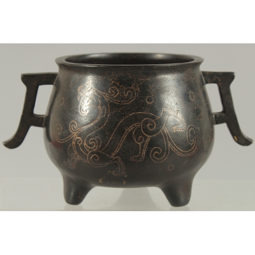 87 - A CHINESE SILVER WIRE INLAID BRONZE TWIN HANDLE CENSER, the inlay depicting chilong, mark to base 'S... 