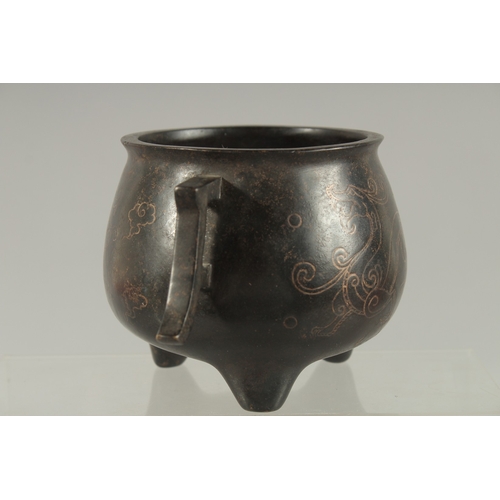 87 - A CHINESE SILVER WIRE INLAID BRONZE TWIN HANDLE CENSER, the inlay depicting chilong, mark to base 'S... 