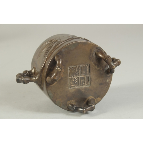 91 - AN 18TH-19TH CENTURY CHINESE BAMBOO DESIGN BRONZE CENSER, with bamboo-form twin handles and raised o... 