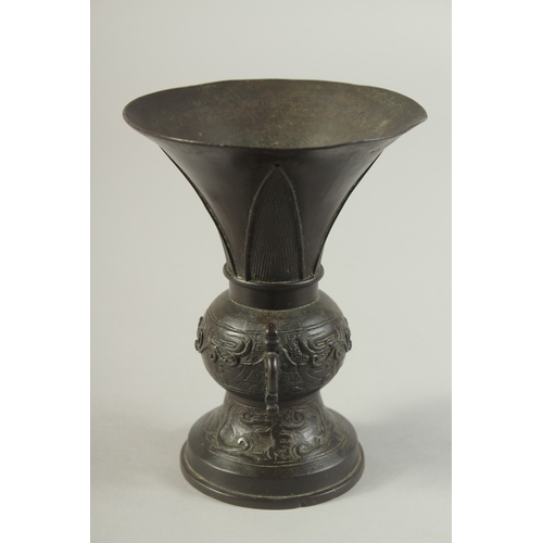 92 - A CHINESE BRONZE TWIN HANDLE VASE, Ming dynasty or later, 13.5cm high.