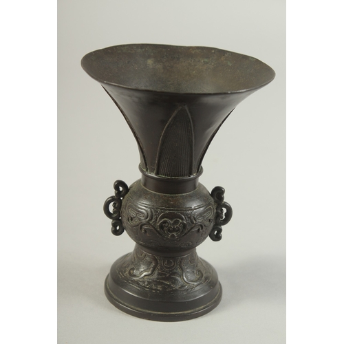 92 - A CHINESE BRONZE TWIN HANDLE VASE, Ming dynasty or later, 13.5cm high.