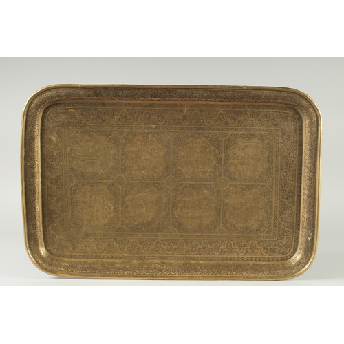 A large 19th century Persian Qajar engraved brass tray, …