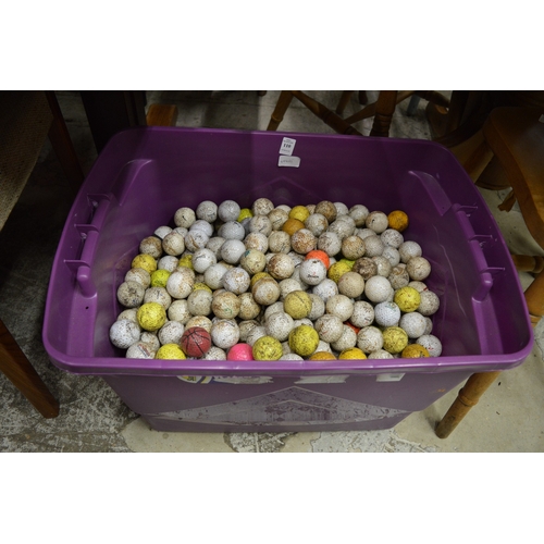 110 - A large quantity of used golf balls.