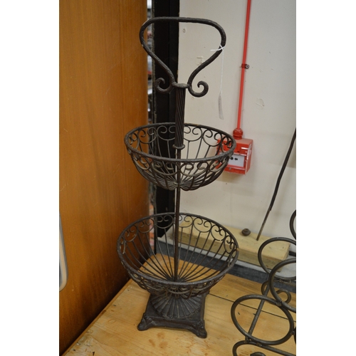 12 - A wrought iron two tier fruit basket.