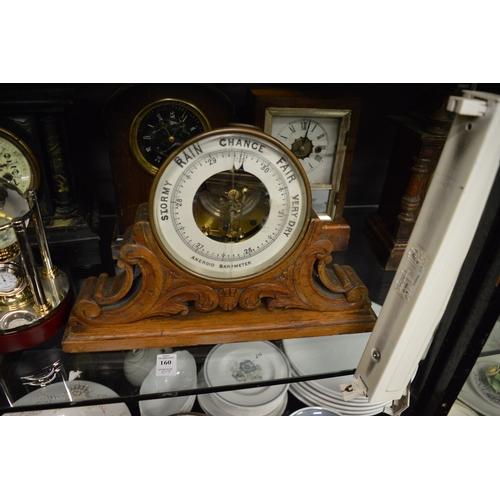 160 - Various clocks and a barometer.