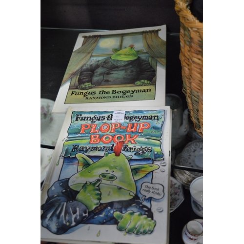 161 - A Worzel Gummidge doll, a gold plush monkey, Fungus the Bogeyman pop-up book and another similar.