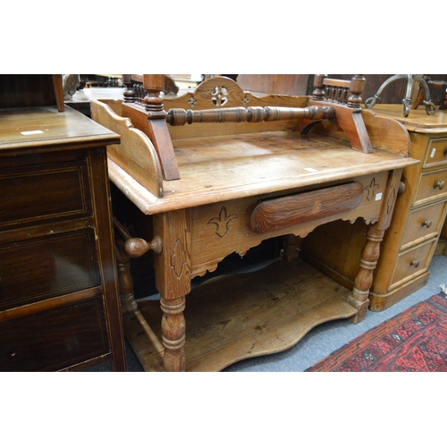 243 - A Victorian pitch pine washstand.