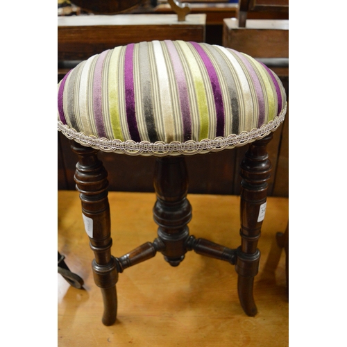 245 - A Victorian mahogany piano or dressing table stool.