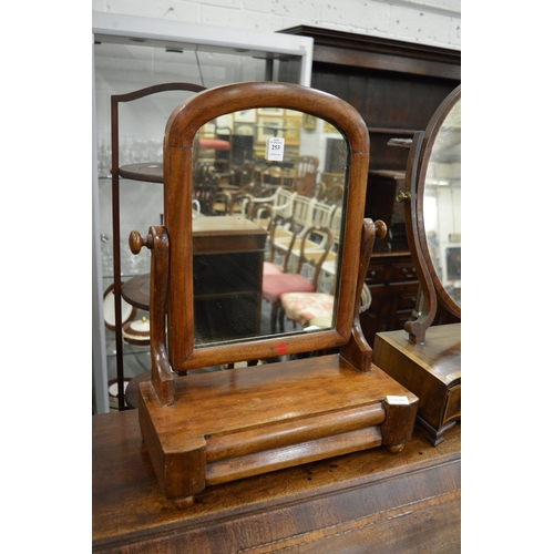 253 - A Victorian mahogany dressing table mirror.