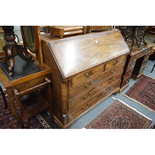 255 - A good George III mahogany bureau.