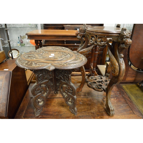 257 - A carved Chinese occasional table with folding base together with a similar stand.