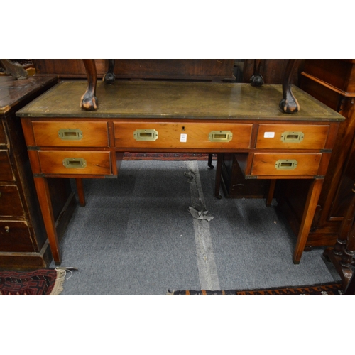 261 - A military style brass bound writing desk with green leather inset top.
