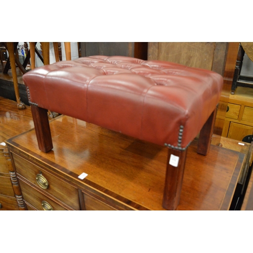 272 - A good red button upholstered leather stool.