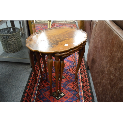 278 - A mahogany nest of tables.