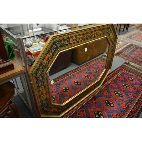 279 - A good large octagonal shaped mirror with decorative floral frame.
