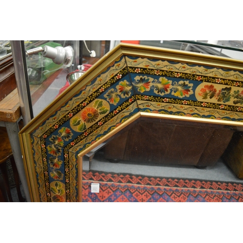 279 - A good large octagonal shaped mirror with decorative floral frame.