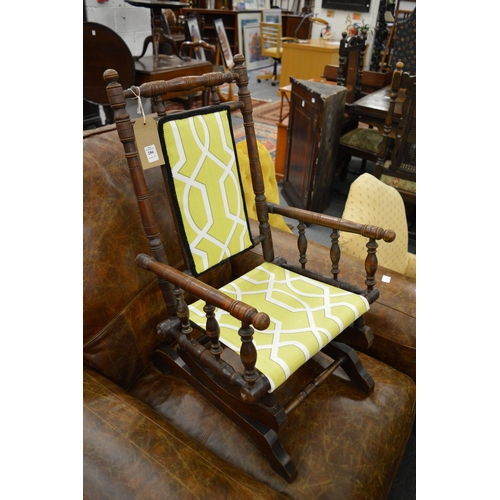 286 - A good American child's rocking chair with modern upholstered back and seat.