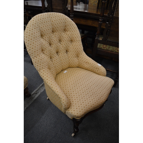294 - A Victorian mahogany framed and button upholstered bedroom chair.