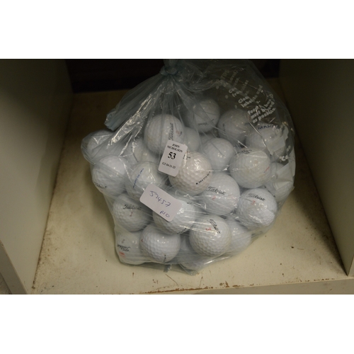 53 - Fifty Titleist golf balls.