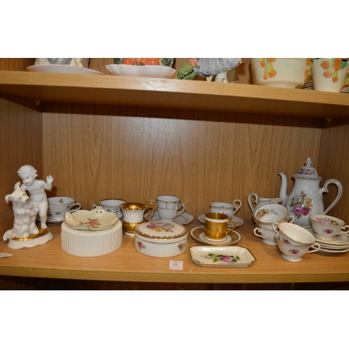 61 - A Rosenthal porcelain group of a young boy and dog together with other porcelain from the same manuf... 