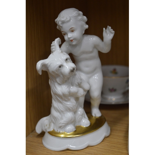 61 - A Rosenthal porcelain group of a young boy and dog together with other porcelain from the same manuf... 