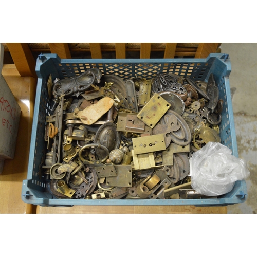 74 - Quantity of furniture brass ware to include locks, handles, castors etc.