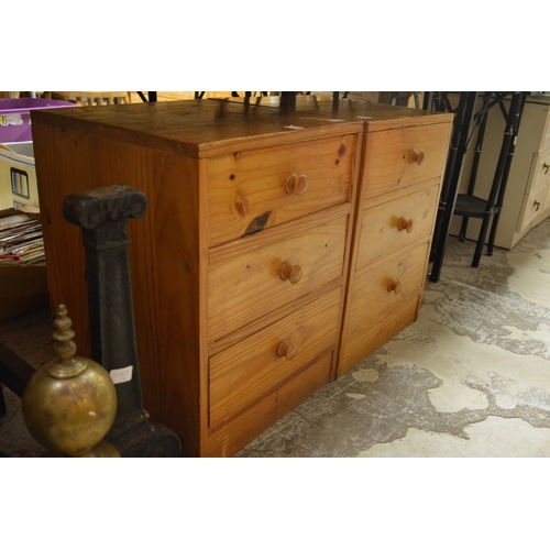 84 - A pair of pine bedside chests.