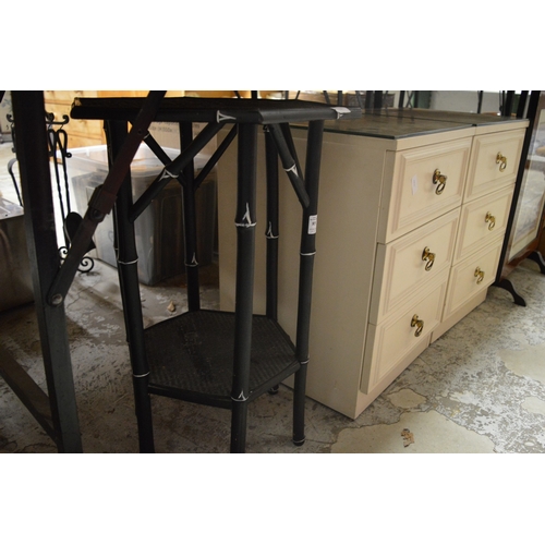 85 - Ebonised occasional table and pair of bedside chests.