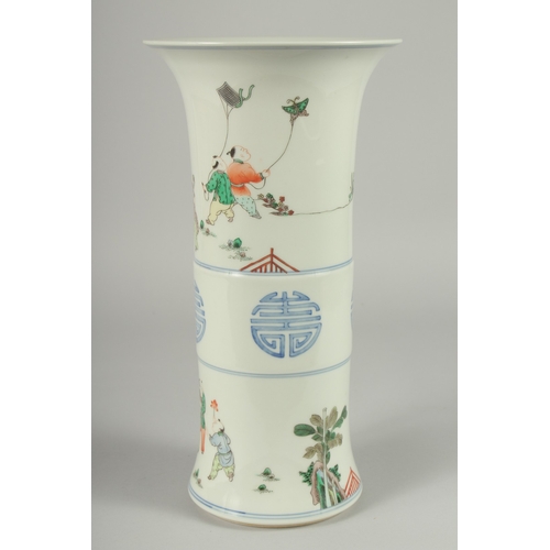 106 - A CHINESE FAMILLE VERTE PORCELAIN GU SHAPE VASE, decorated with boys and longevity symbols, 34cm hig... 