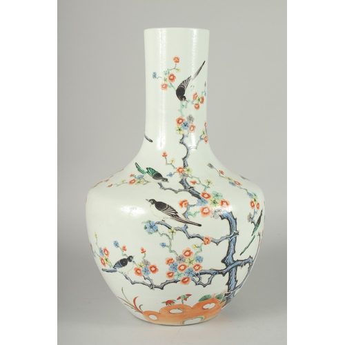 109 - A LARGE CHINESE FAMILLE VERTE PORCELAIN VASE, painted with birds on branches of flowering trees, six... 