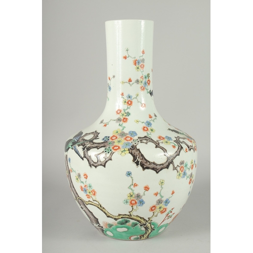 109 - A LARGE CHINESE FAMILLE VERTE PORCELAIN VASE, painted with birds on branches of flowering trees, six... 