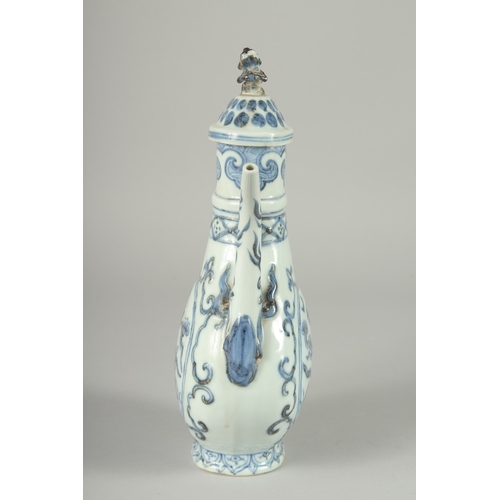 110 - A CHINESE EXPORT ISLAMIC MARKET BLUE AND WHITE PORCELAIN LIDDED EWER, 27cm high.