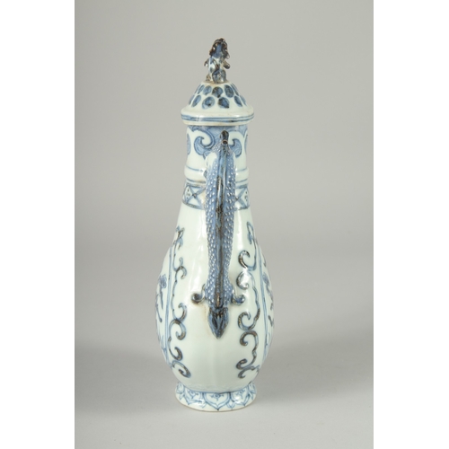 110 - A CHINESE EXPORT ISLAMIC MARKET BLUE AND WHITE PORCELAIN LIDDED EWER, 27cm high.