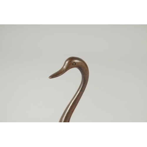 121 - A JAPANESE BRONZE OKIMONO OF A SWAN.