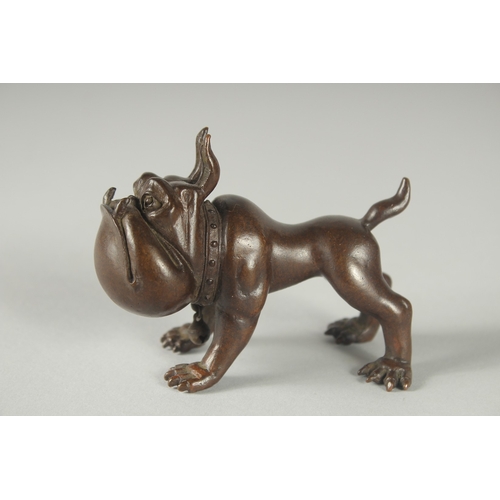 123 - A JAPANESE BRONZE OKIMONO OF A DOG.