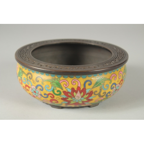 126 - A CHINESE CLOISONNE ENAMELLED BRONZE CENSER, with copper wire floral motifs on a yellow ground, 15.5... 