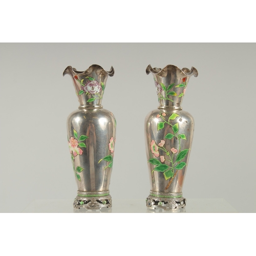 131 - A FINE PAIR OF CHINESE ENAMELLED SILVER VASES, each decorated with enamelled floral sprays, the neck... 